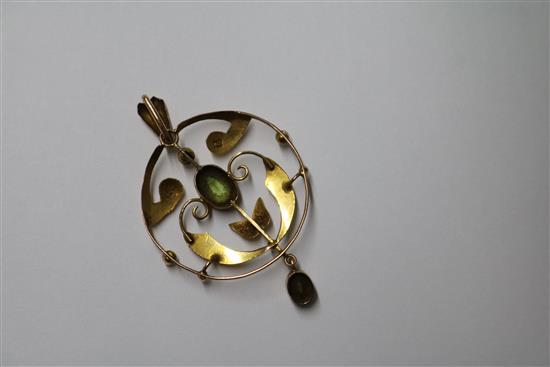 An Edwardian gold openwork pendant set amethyst and pearl, a peridot set pendant and a 15ct gold and turquoise heart pendant